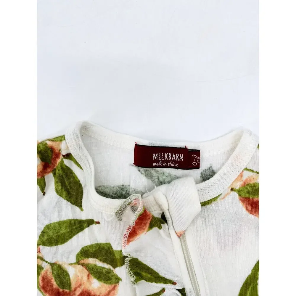 Milkbarn floral ruffle footsie one piece
